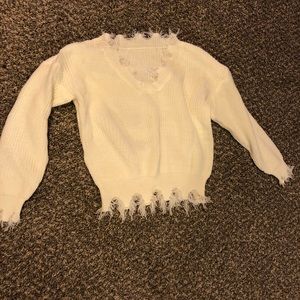 Distressed sweater